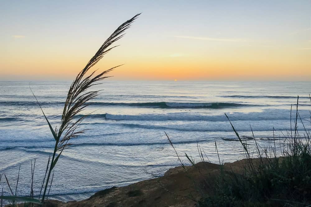 Surfers enjoying a nice sunset surf at Paparucos