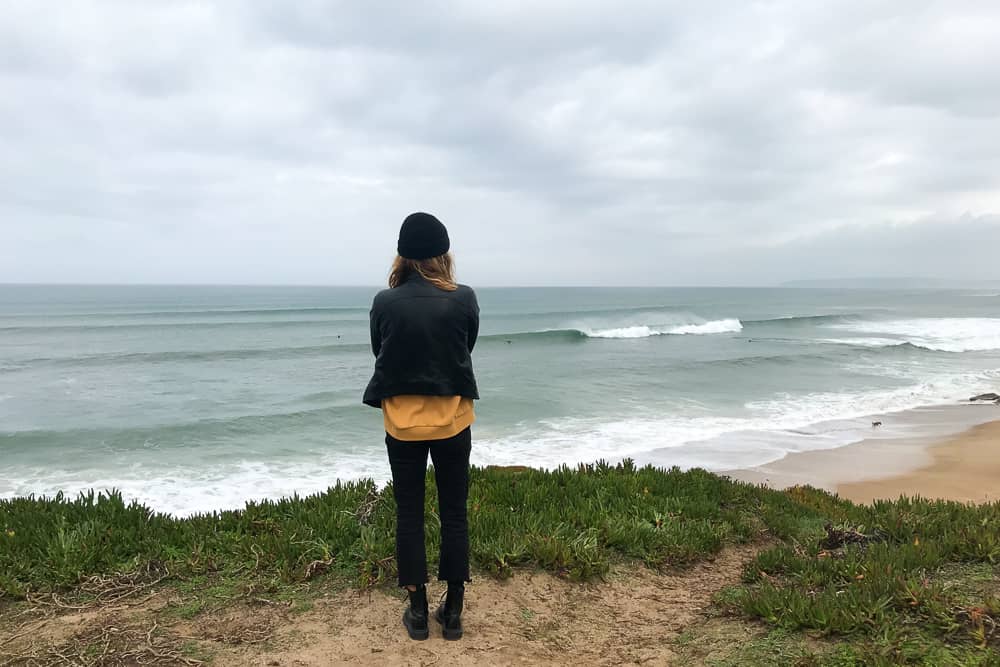 Surfer checking the waves at the surf spot Gigi in Peniche